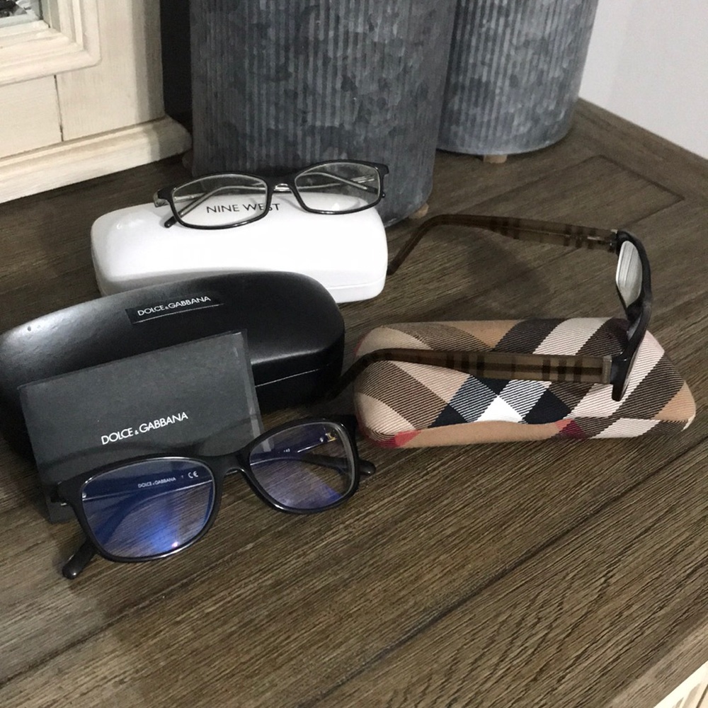 Eyeglasses and cases. Burberry and Dolce & Gabbana